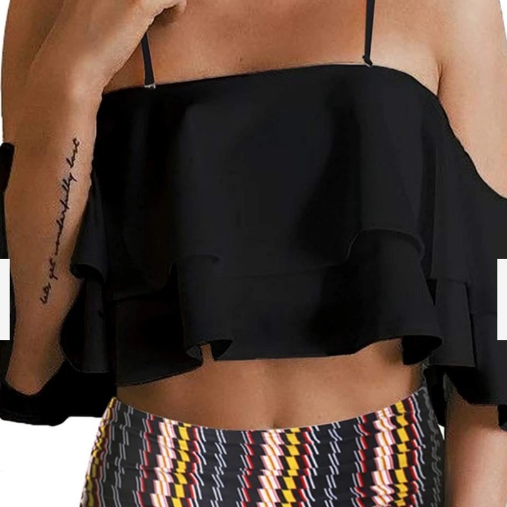 A ruffle falbala off the shoulder top only.